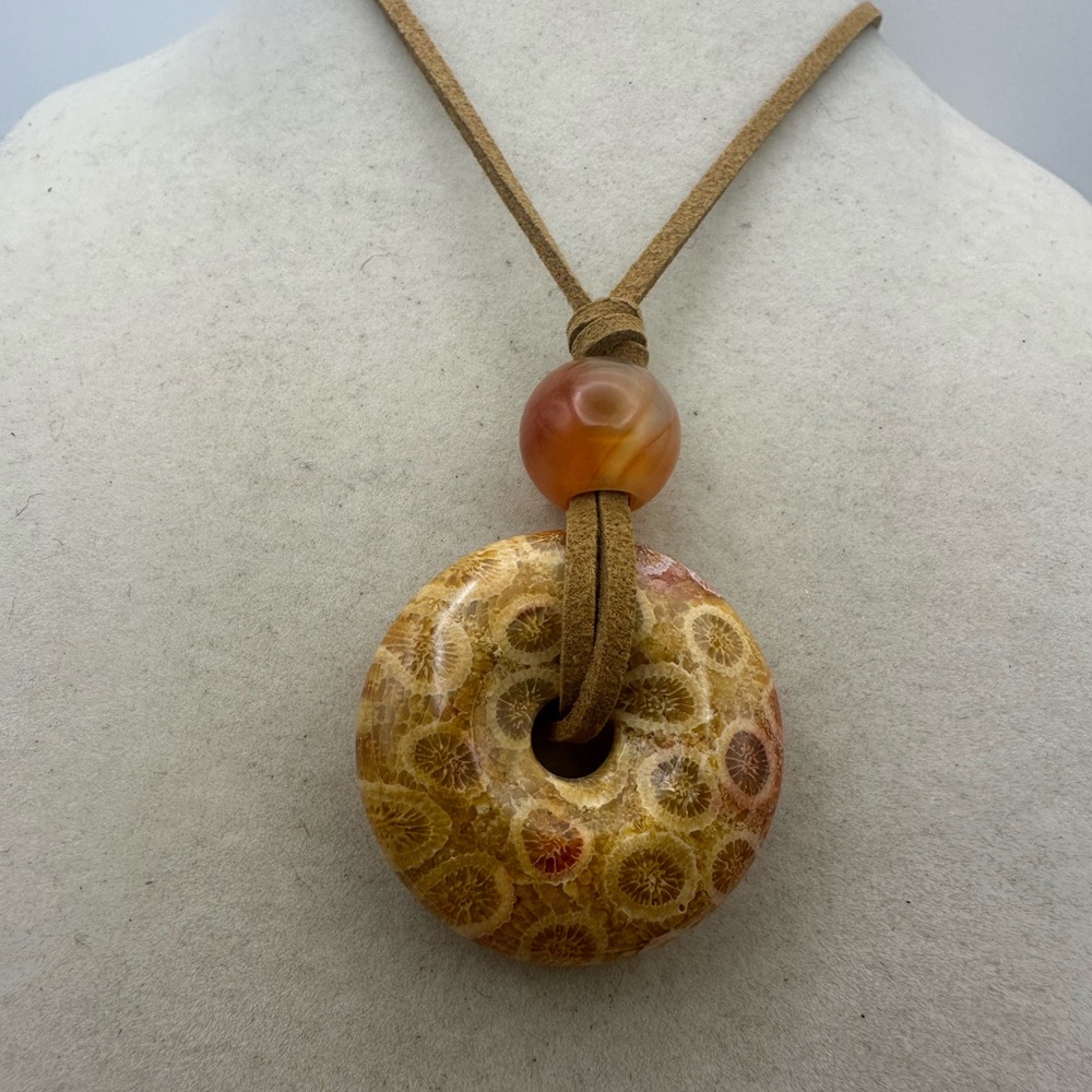 Brown and Tan Coral Fossil Donut Pendant Necklace on Brown Faux Suede - Picture 10 of 13